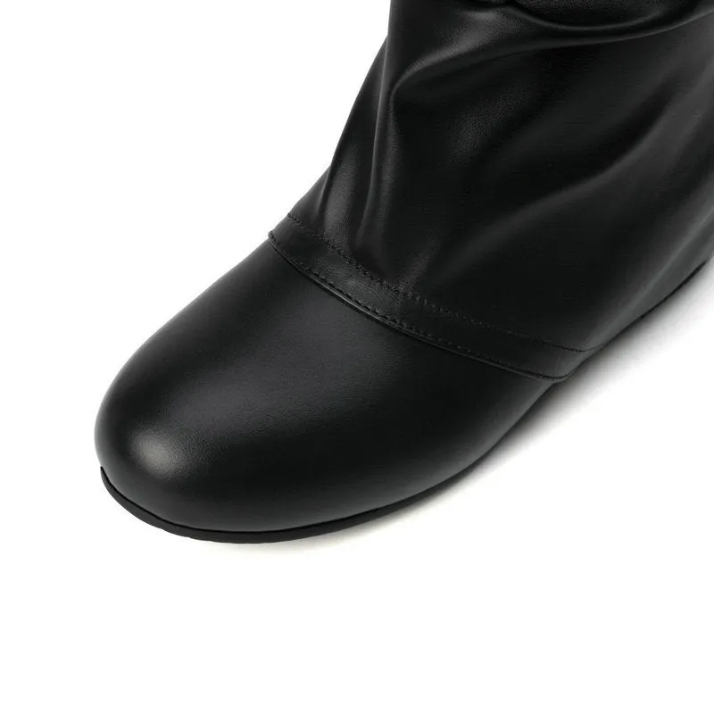 Hidden wedge heels back tie-up mid calf slouchy boots